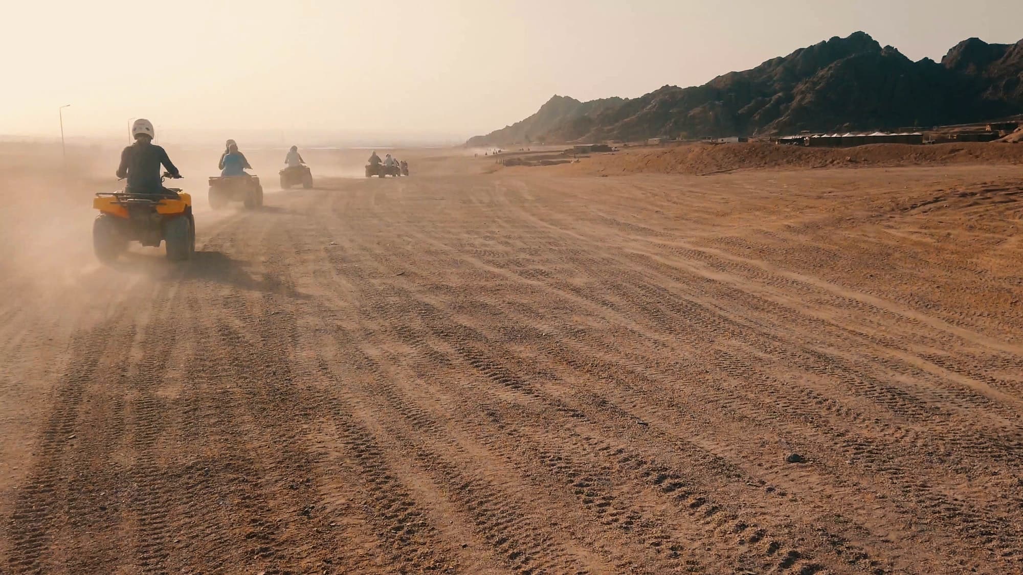 Desert safari adventure in Hurghada with quad bikes and Eastern Desert mountains