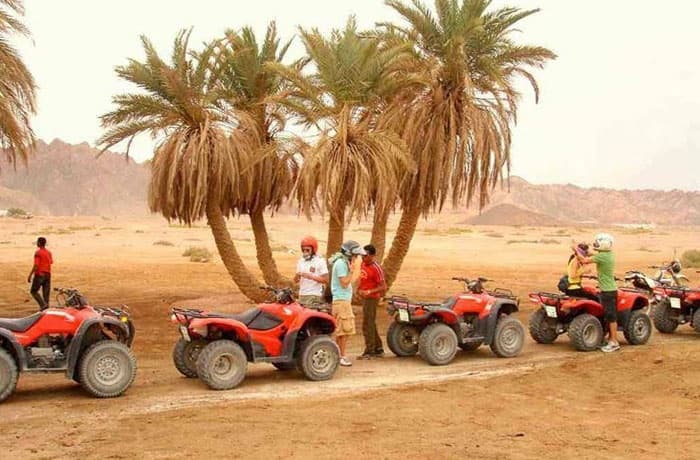 Desert safari adventure in Hurghada with quad bikes and Eastern Desert mountains